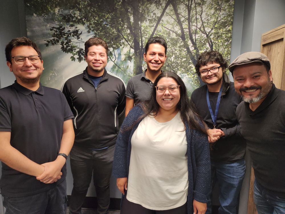 Express CU staff posing for a picture during Hispanic Heritage Month